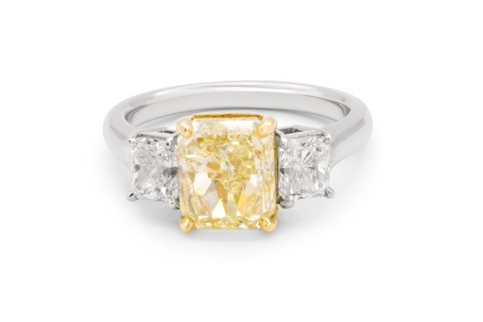 Platinum Yellow Diamond Three Stone Ring set with 1 radiant cut yellow diamond (3.00ct