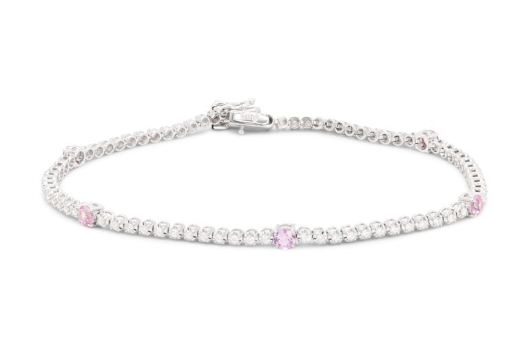 18K White Gold Sapphire and Diamond Bracelet set with 5 oval shaped pink sapphires (.61ctw) and 75 round diamonds (FG/VS-VVS) (0.55ctw